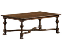 Canterbury traditional transitional cocktail table with turned legs and x bottom stretcher by Woodland Furniture in Idaho Falls